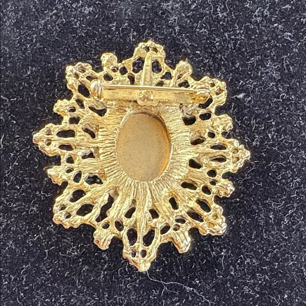 Elegant Scroll Brooch with Rose